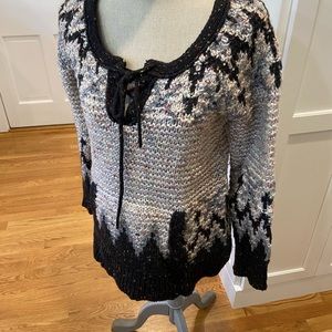 Free People heavy sweater. size small. Multi color with black edging.